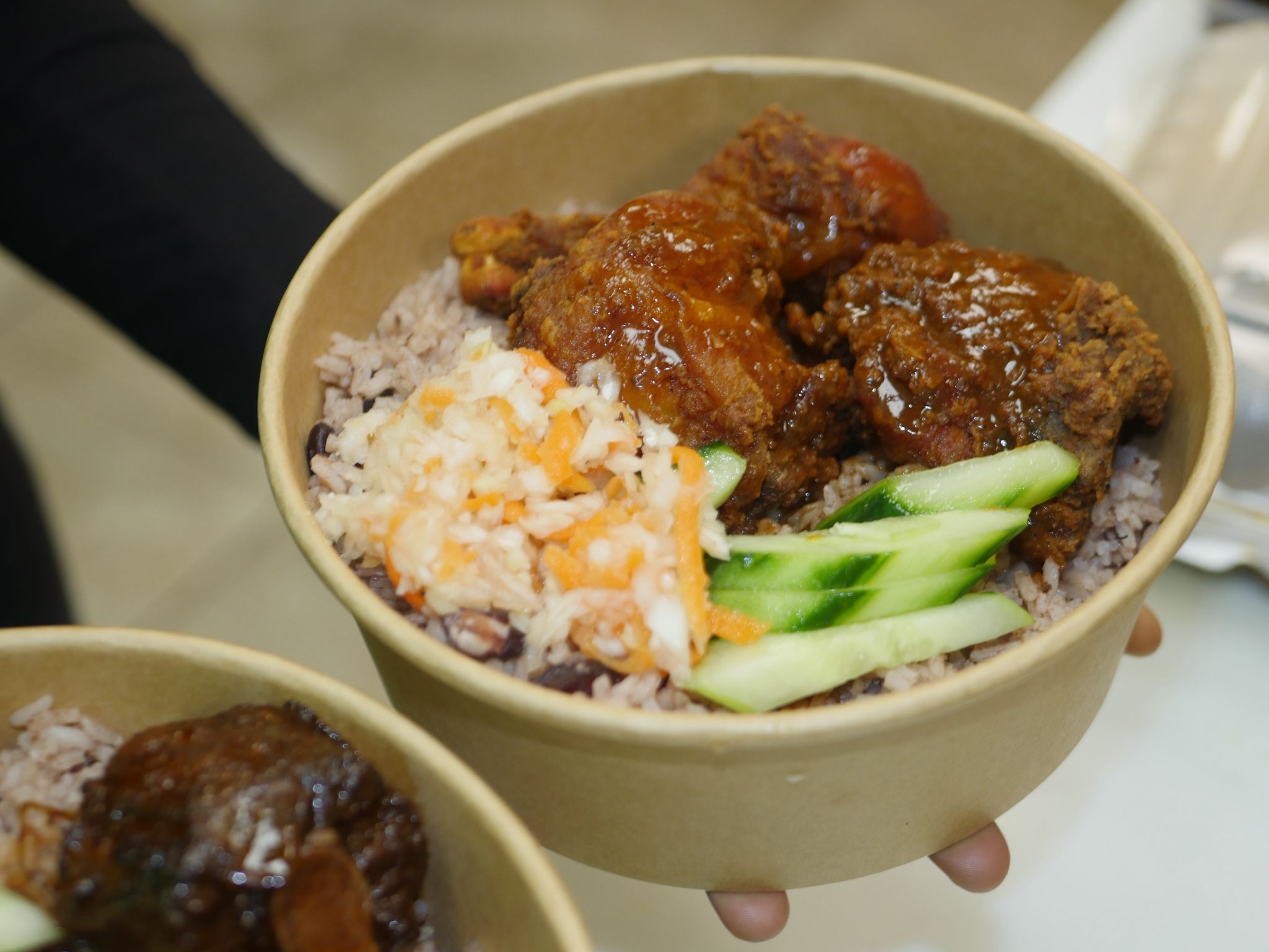 Stew chicken bowl at 9 Mile Toronto